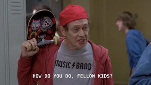 Still from a television comedy captioned How do you do, fellow kids?