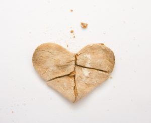 Heart-shaped biscuit broken in two